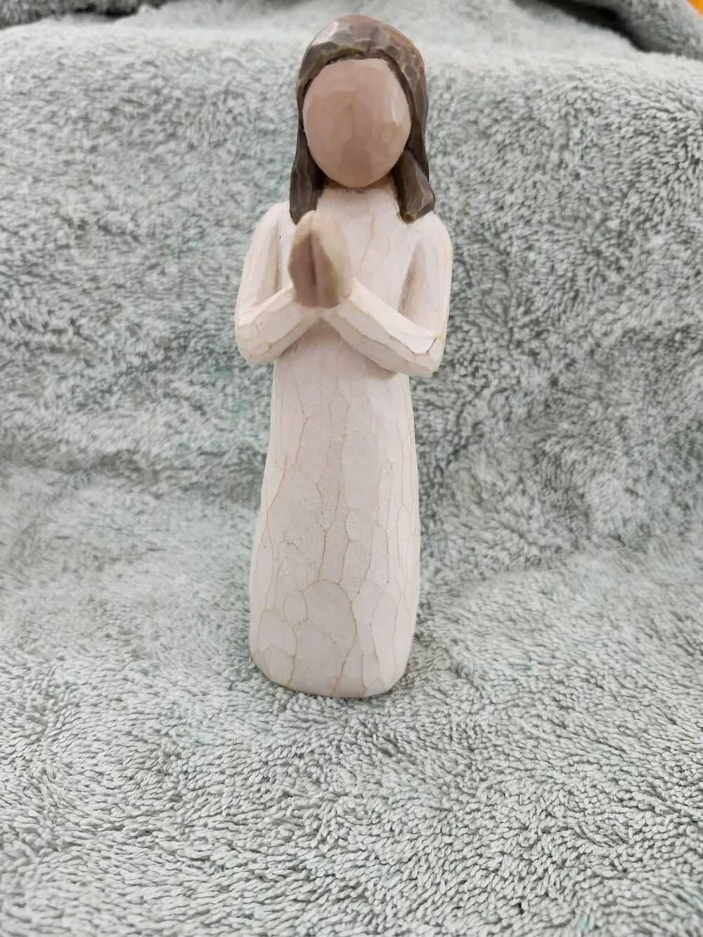 Willow Tree figurine titled "Sisters by Heart" sculpted by artist Susan Lordi.Ar